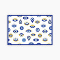 Pattern of eyes with blue and yellow accents on a white background and blue border
