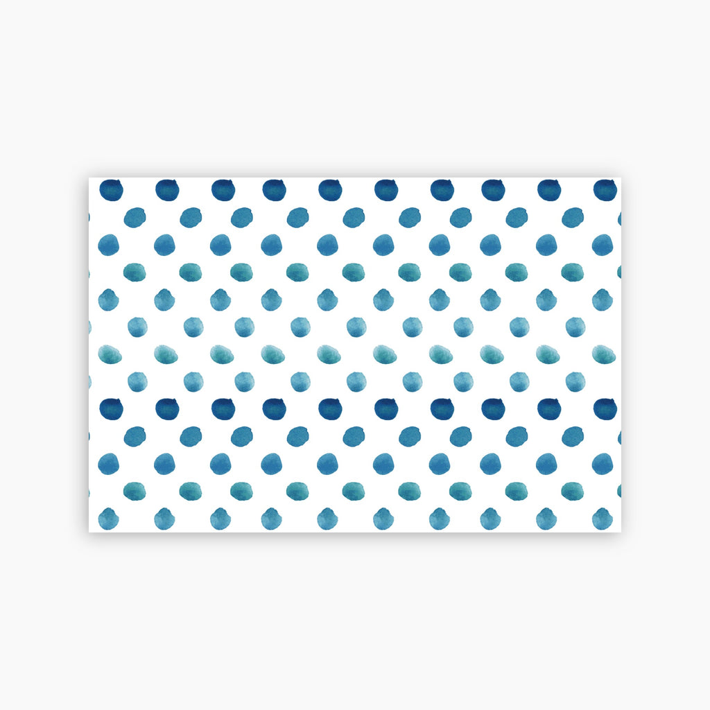 Pattern of blue watercolor dots on a white background printed on a paper placemat