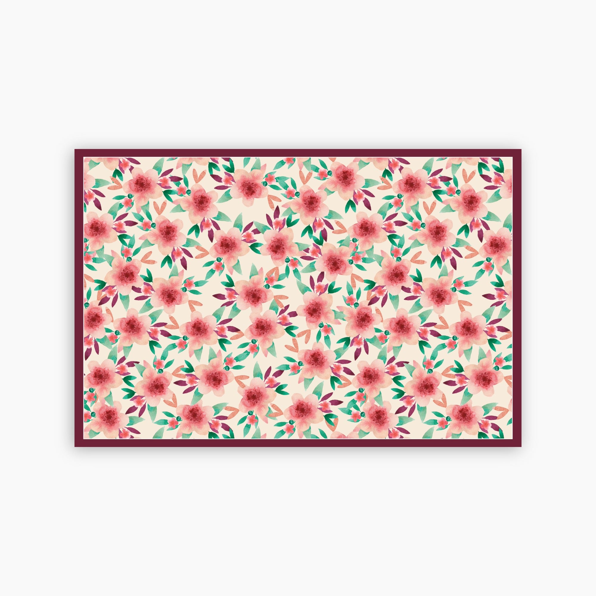 Floral patterned paper placemat with pink flowers and green leaves