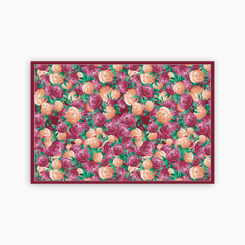 Floral patterned paper placemat with pink and orange flowers 