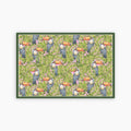 Pattern of toucans and leaves on a green background printed on a paper placemat