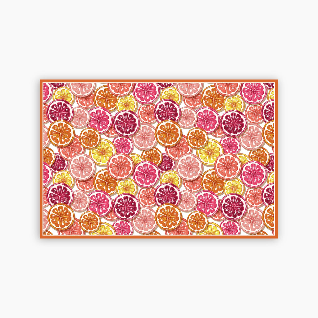 Pattern of colorful citrus slices on a white background