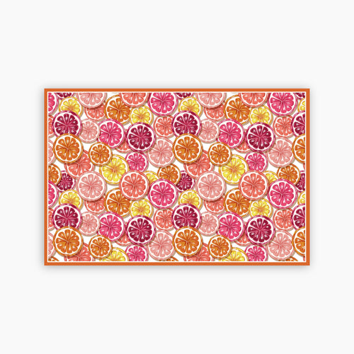 Pattern of colorful citrus slices on a white background