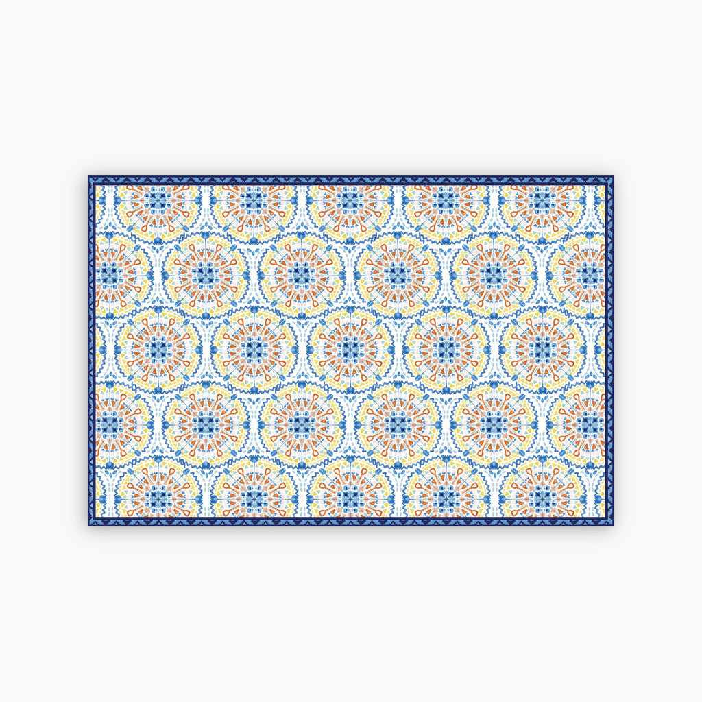 Decorative mat with a colorful geometric pattern on a white background