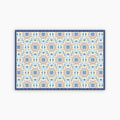 Decorative mat with a colorful geometric pattern on a white background