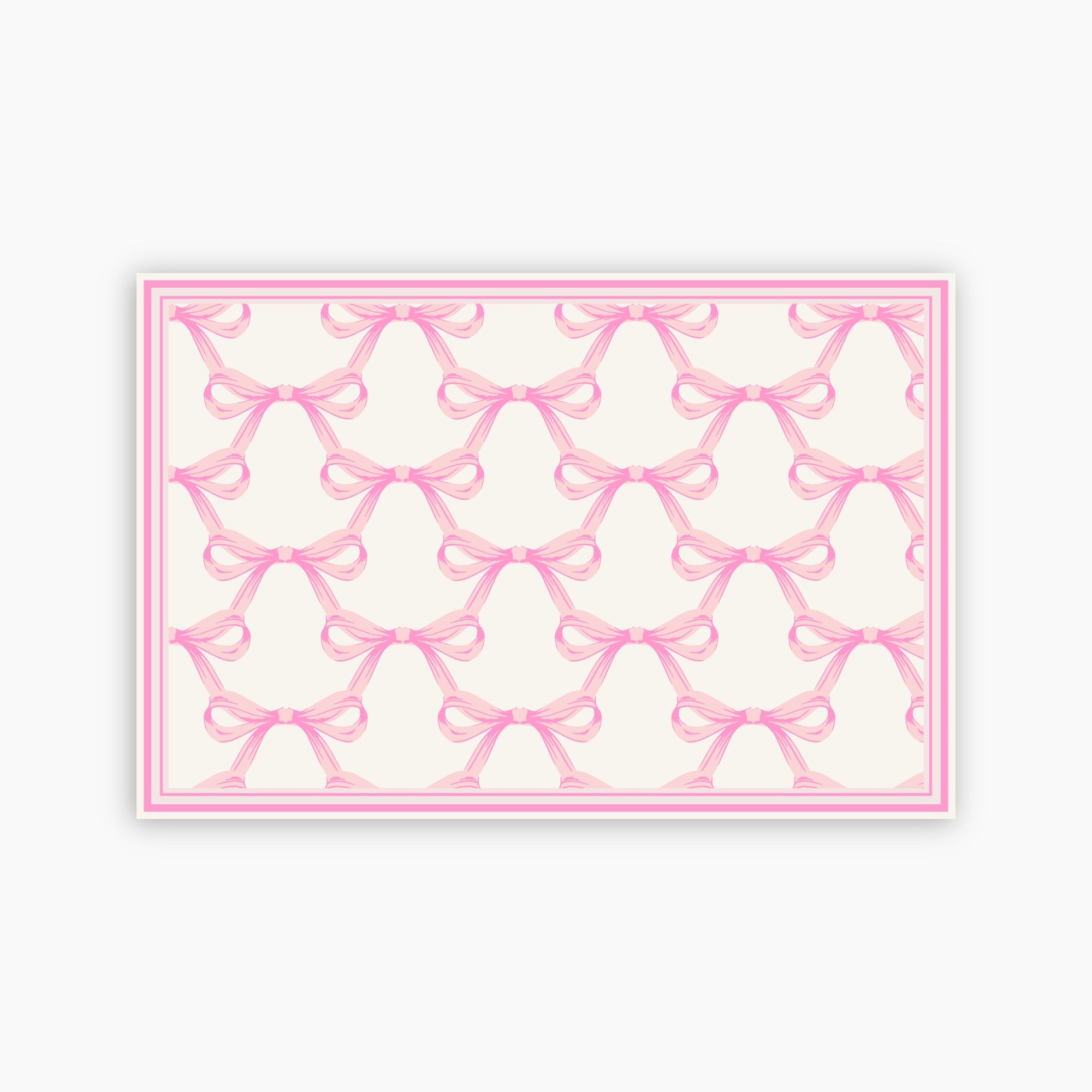 Pattern of pink bows on a white background
