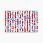 Patterned paper with red and white stripes and blue sea-themed illustrations on a white background
