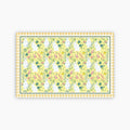 Patterned paper with bunnies and flowers on a yellow background