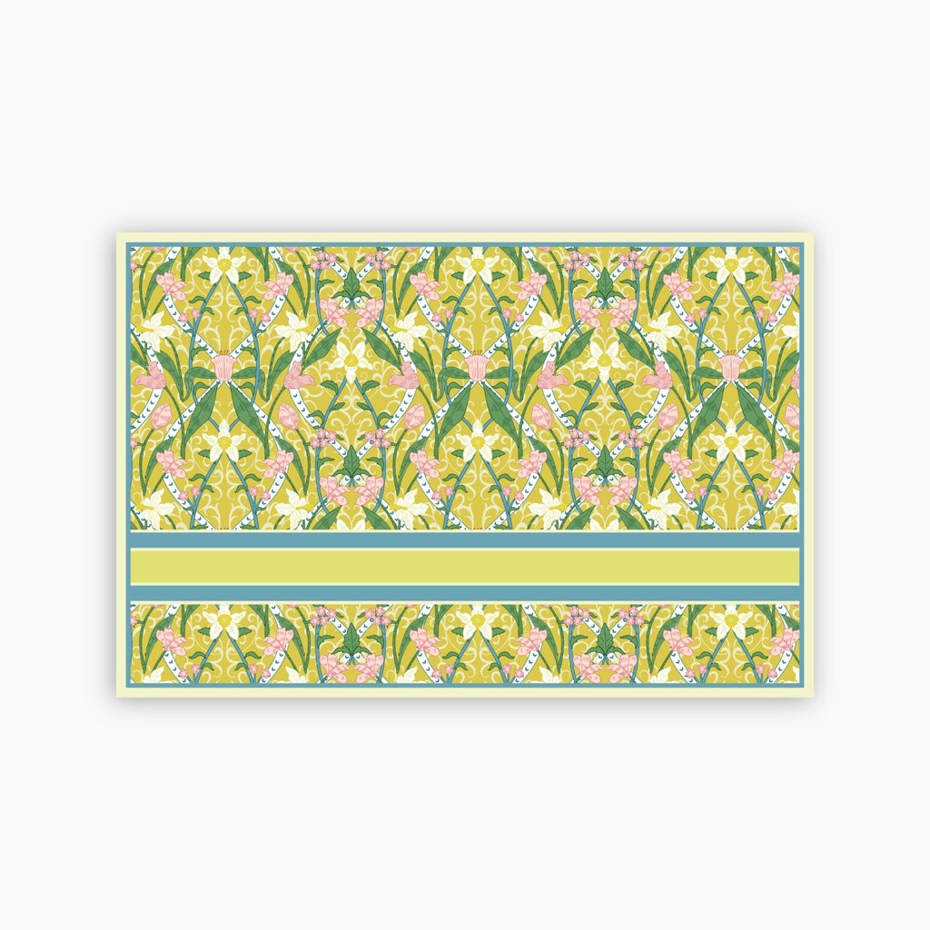 Floral patterned paper with a green border on a white background