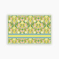 Floral patterned paper with a green border on a white background