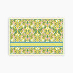 Floral patterned paper with a green border on a white background