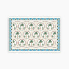 Decorative mat with palm tree pattern on a white background